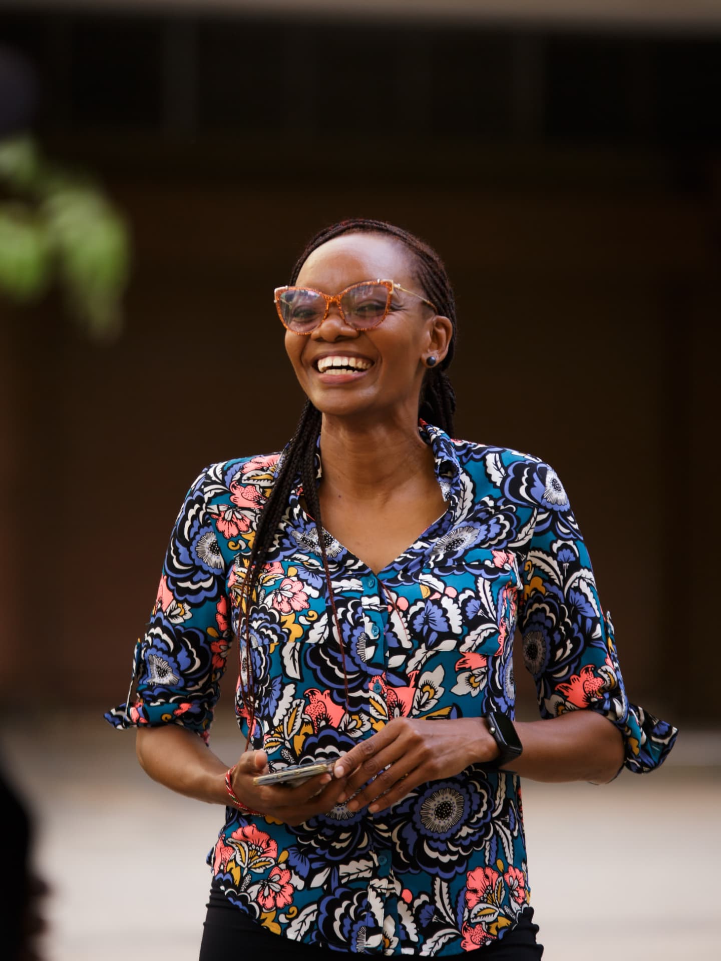 Miss Jackie laughing outdoors